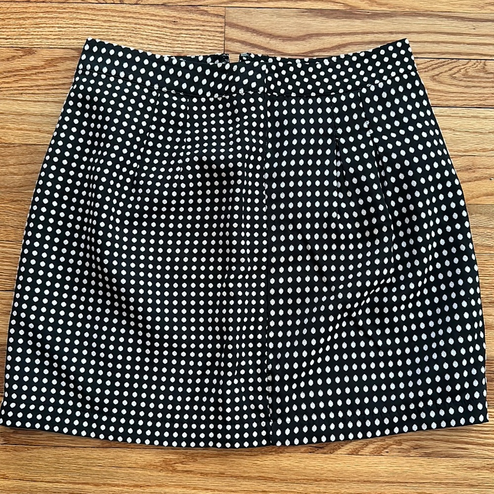 The limited pleated polka dot a line skirt